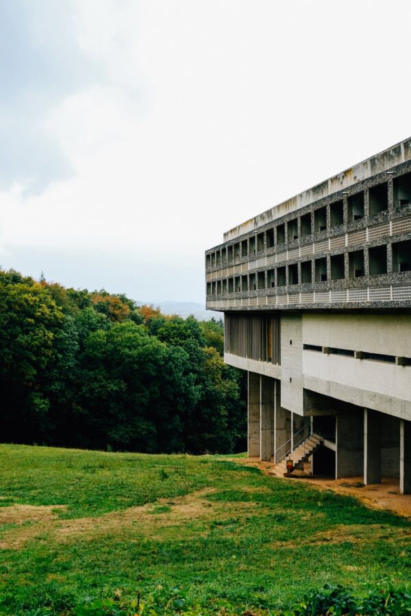 Unfinished concrete building n hilly lush terrain